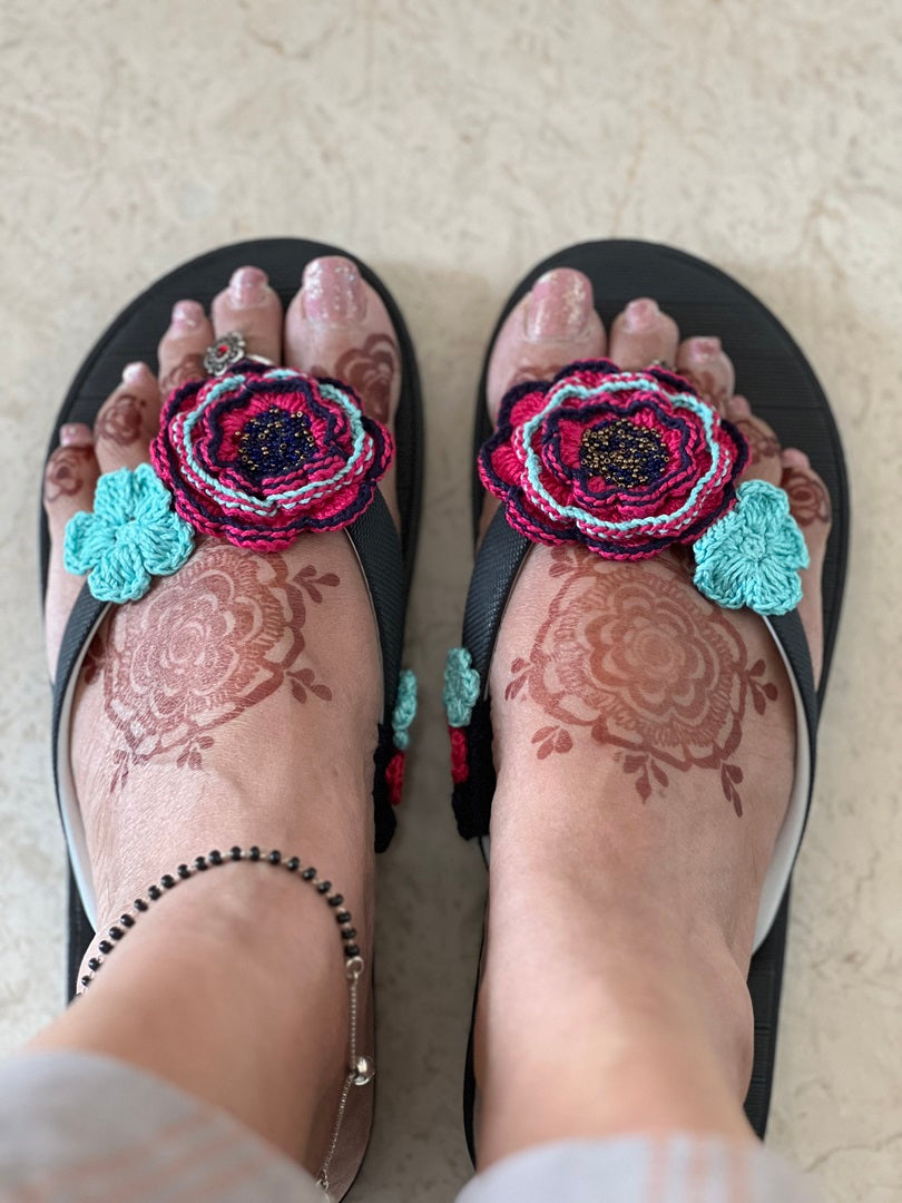 Black flip flops with big crochet flower
