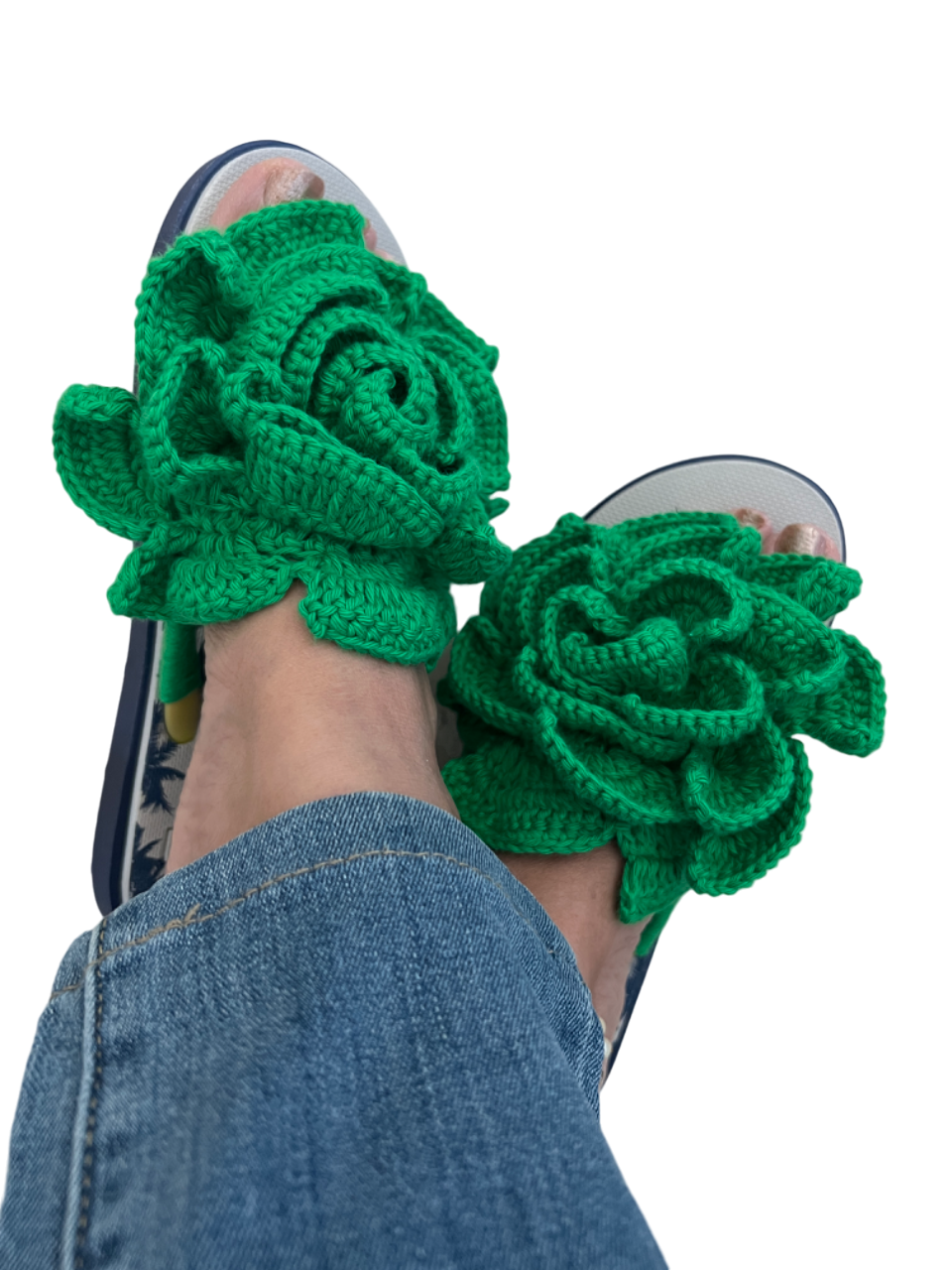 Grey flip flops with big green crochet flower