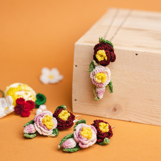 Maroon flowers with buds