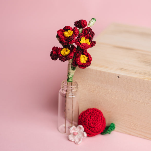 Maroon flowers juda pin